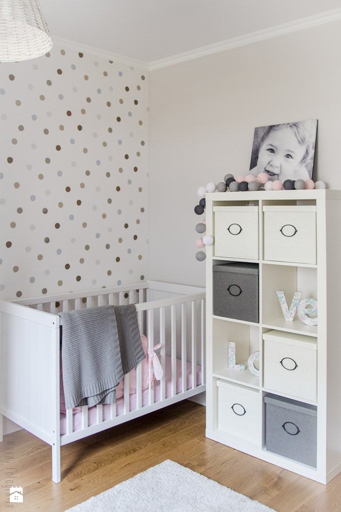 Nursery room with polka dots on wall