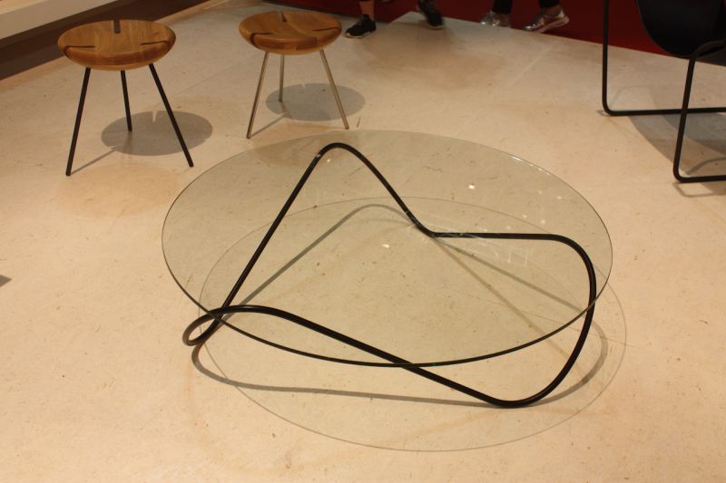 For the minimalist, we found this Kaeko coffee table from Objekto. An expansive glass top provides an unfettered view of the slight, undulating metal base.