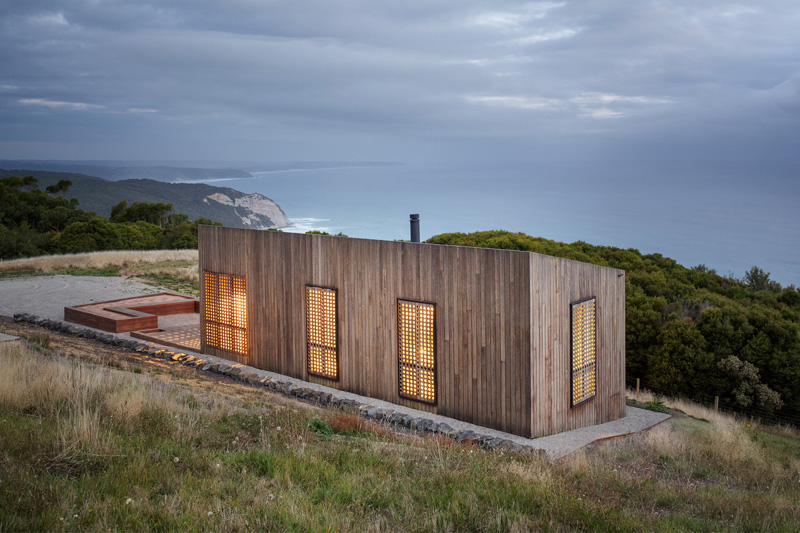 Oceanfront cabin with perforated facades