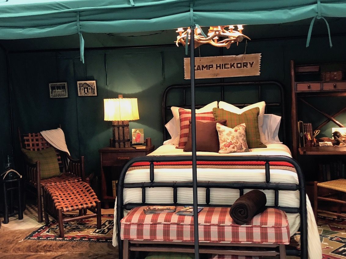 Rustic decor creates a very homey bedroom.