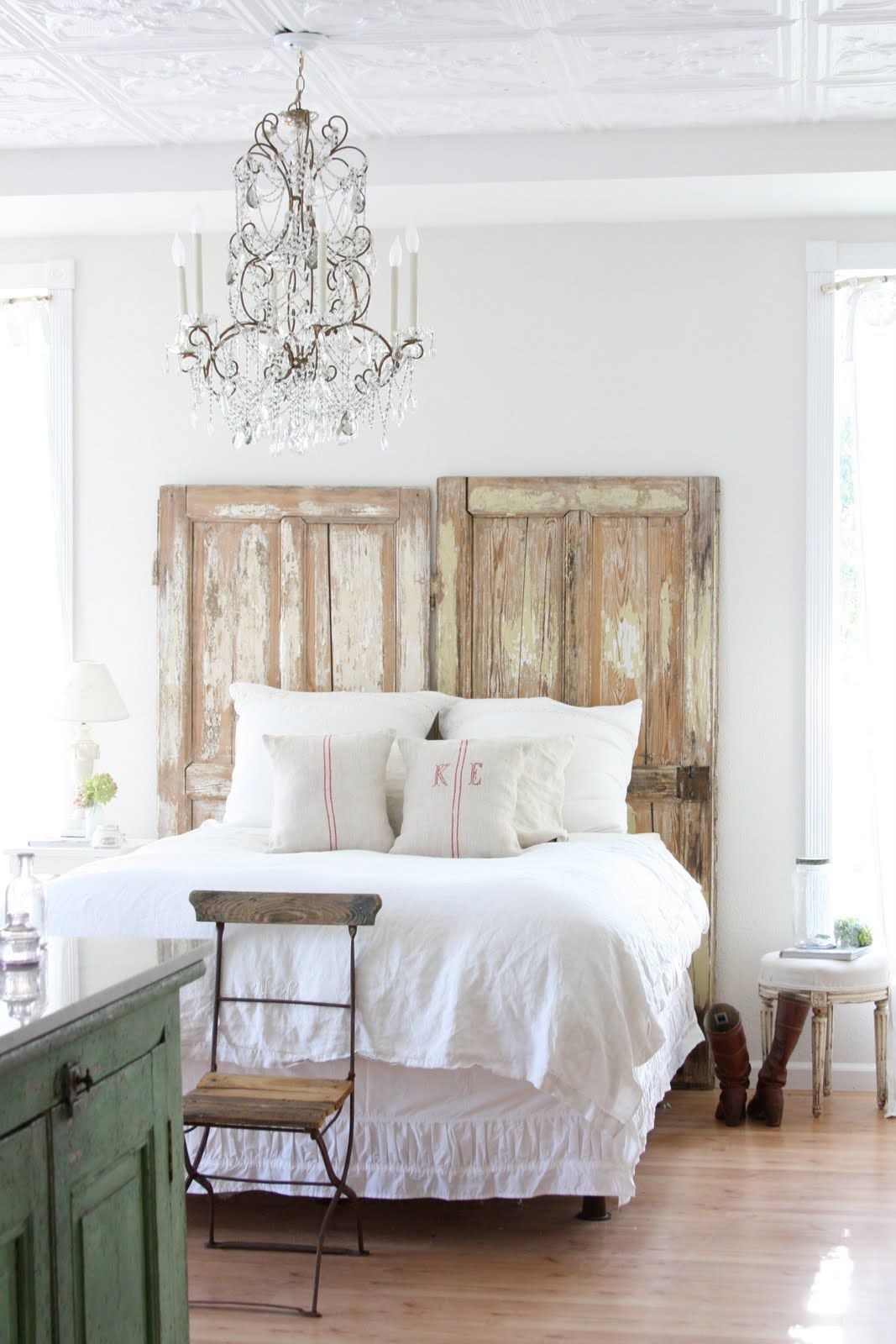 Old doors used for bedroom headboard