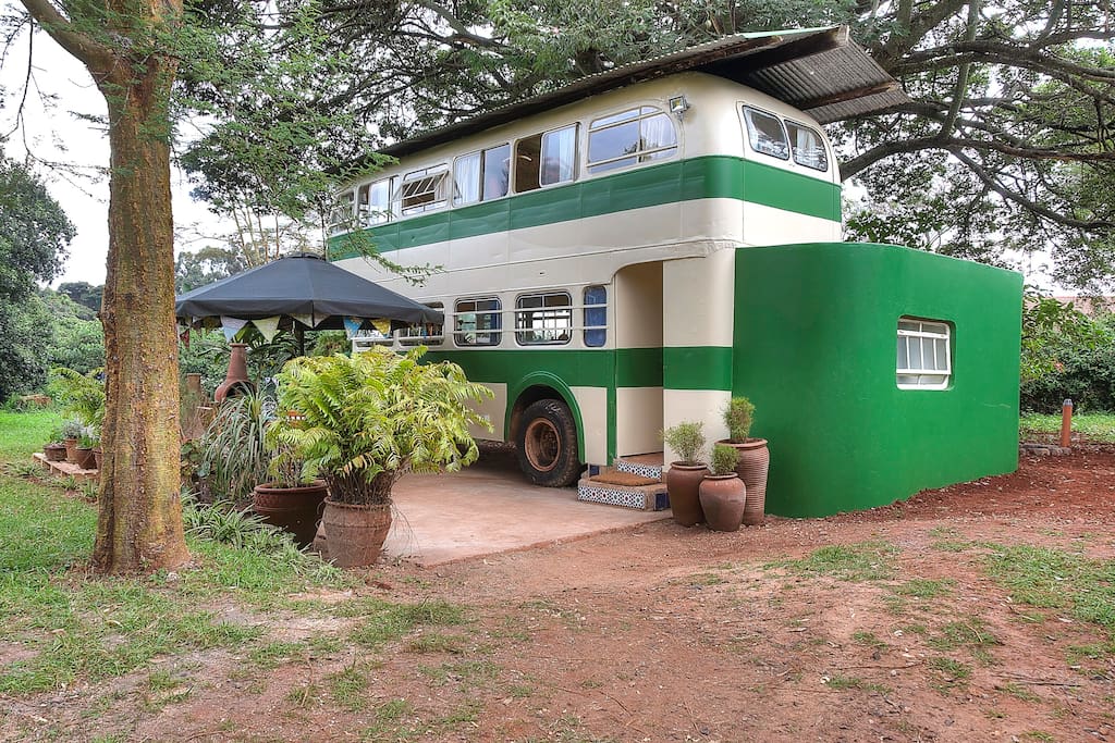 Old school bus into a house in Nairobi Green Exterior