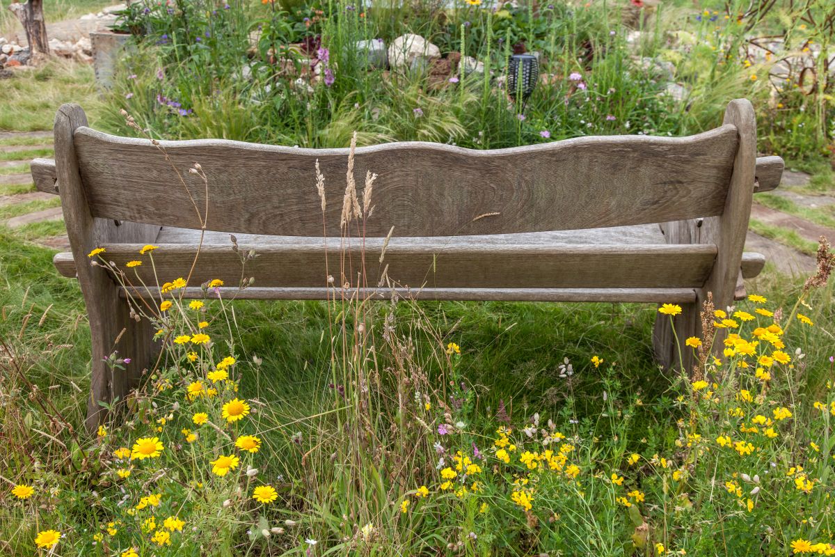 Wooden benches tend to look a bit more bohemian, romantic even 