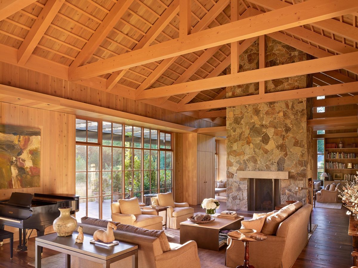 Soaring ceilings and plentiful windows brighten the space.