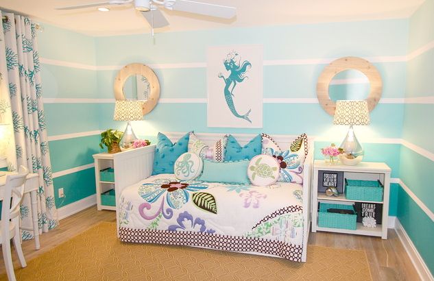 Ombre striped walls and mermaid art