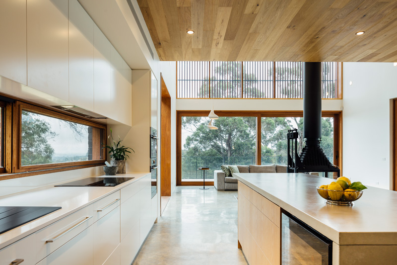 Open space kitchen with a letterbox window above countertop