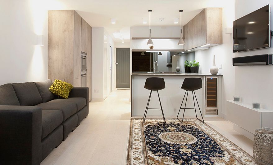 Open space kitchen with modern bar stools