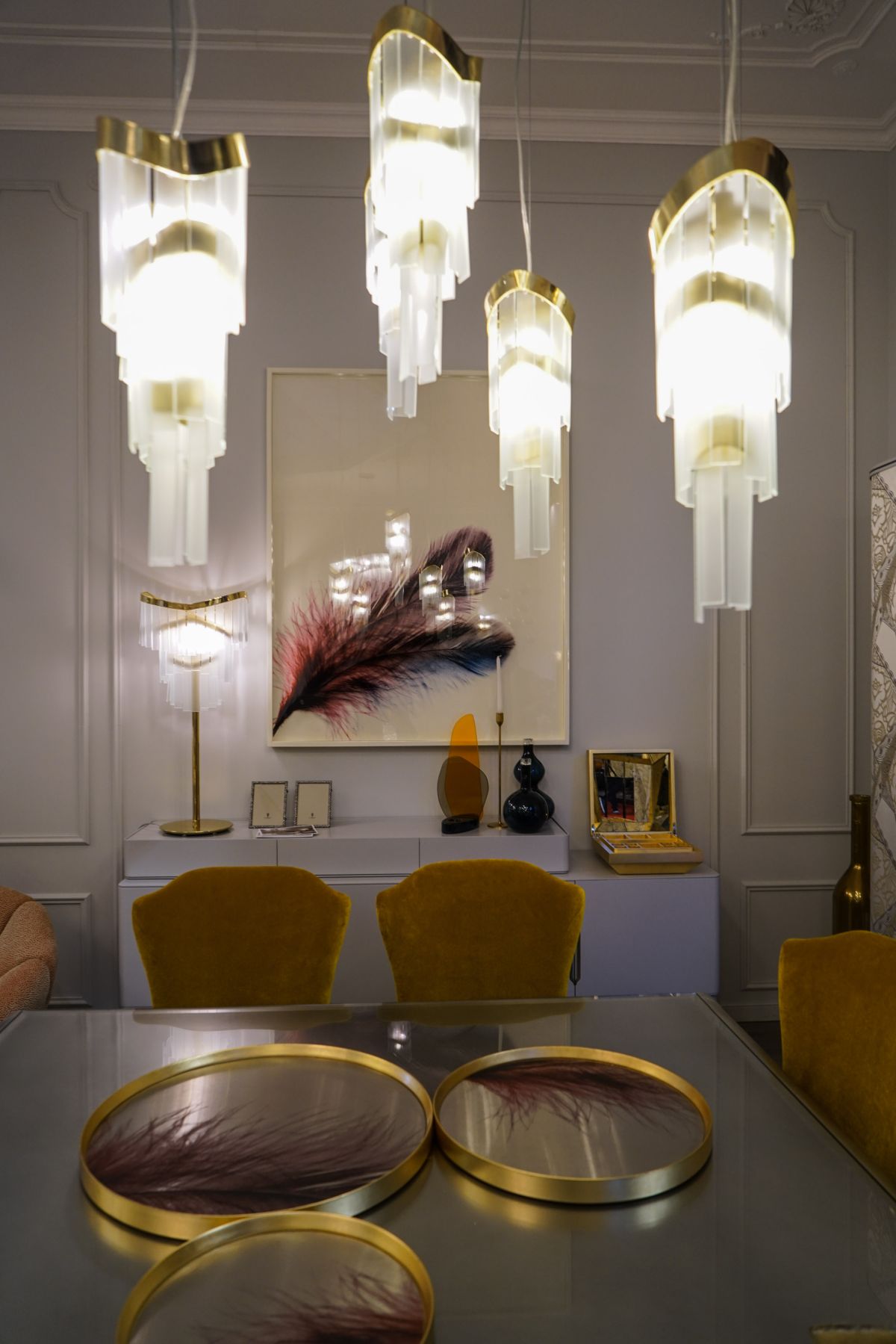 Opulent lighting fixtures above the dining table