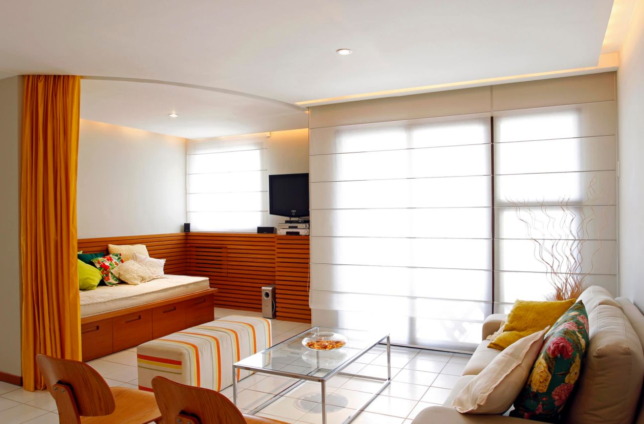 Orange curtain used like a room divider