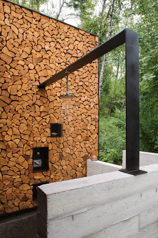 Outdoor Shower featuring log wood stacked