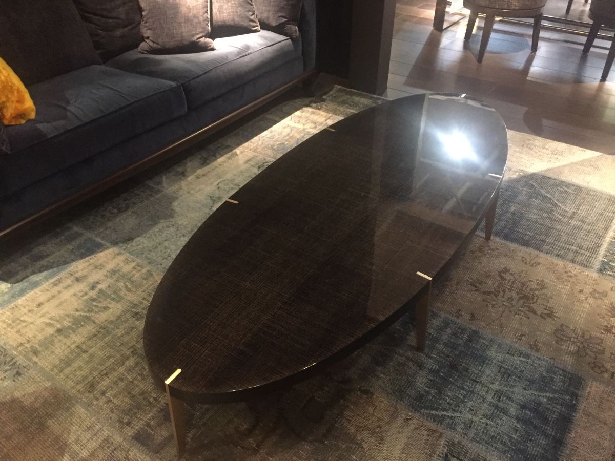 Oval espresso coffee table