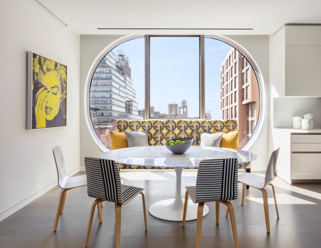 Curves become the focus with this window seat construction.