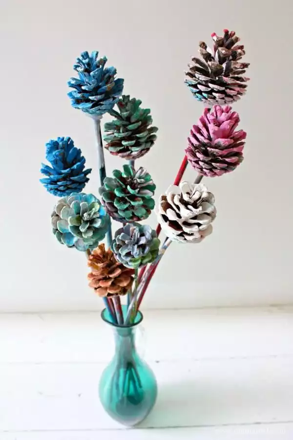 Painted pine cones to create a centerpiece