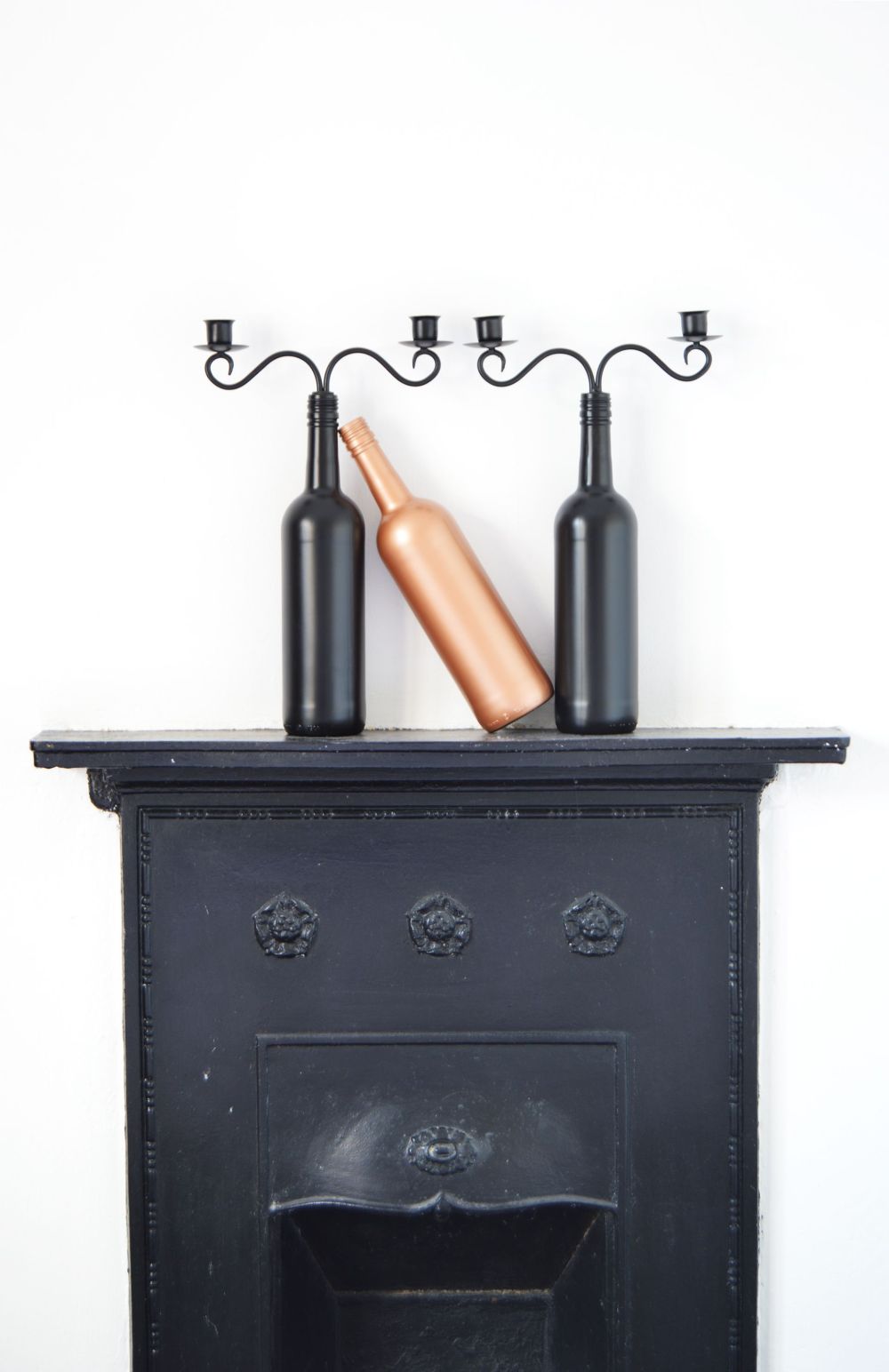 Spray-painted bottle candle holders