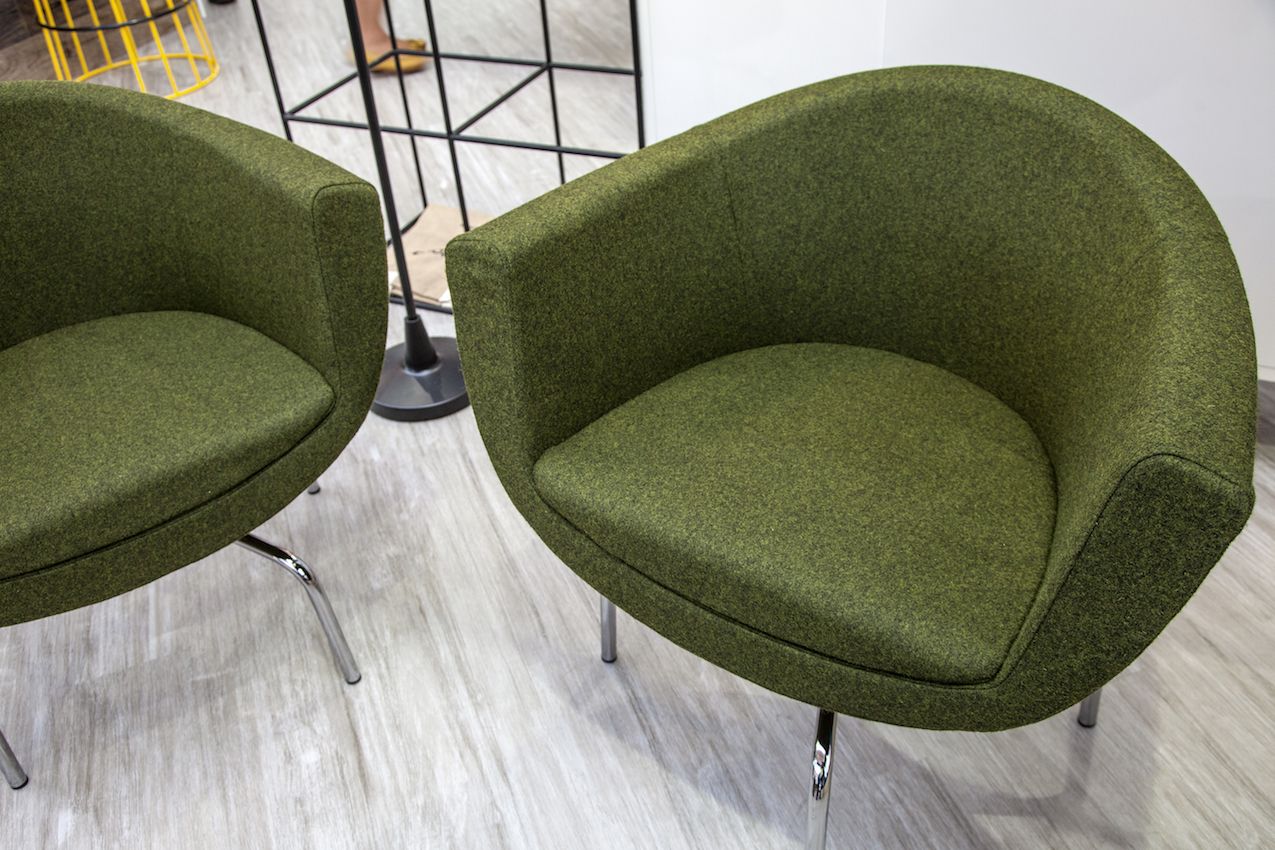 A matched pair like this could be substituted for a larger, heavier love seat in order to lighten the space.