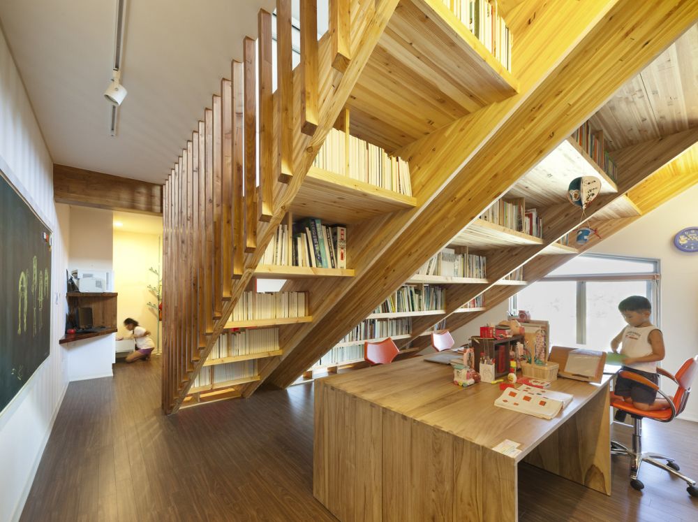 Panorama House with slide for stairs and bookshelf by Moon Hoon under the stairs