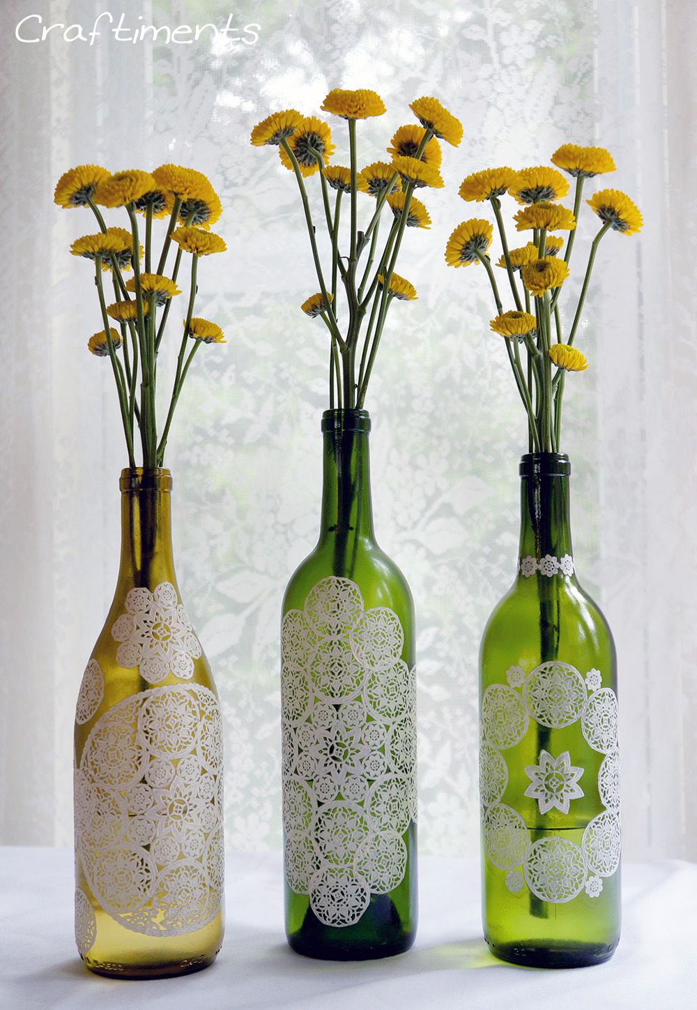 Paper doily decoupage bottle