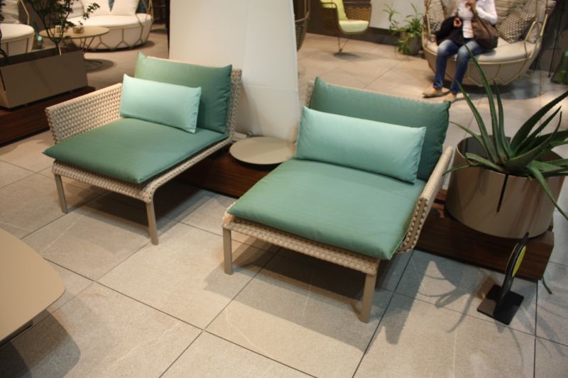 Part chair, part lounge, these chairs fit into a back base that can be customized with a small table in between or a large planter.