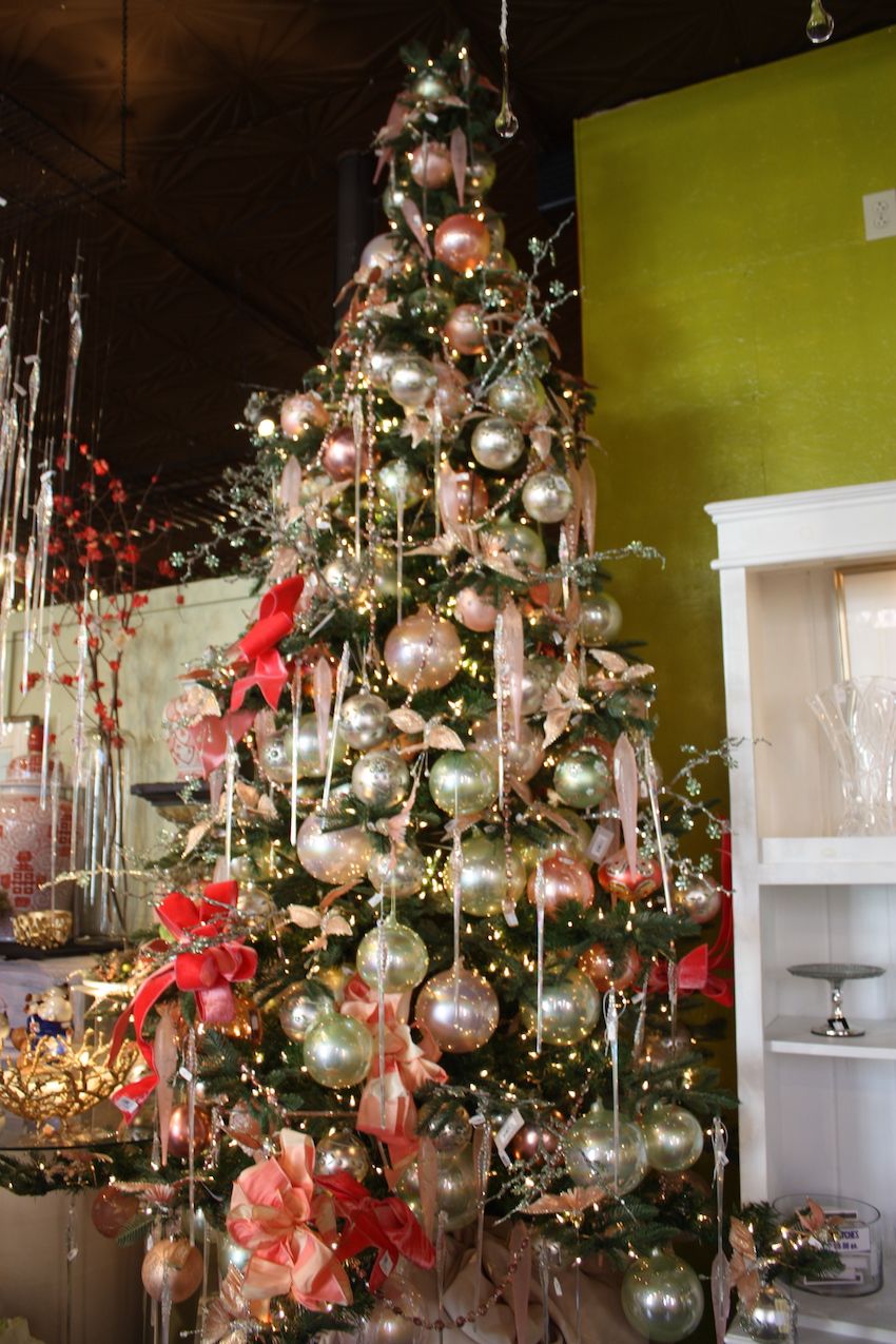 Pale colors create a distinctive mood and look for a large Christmas tree.