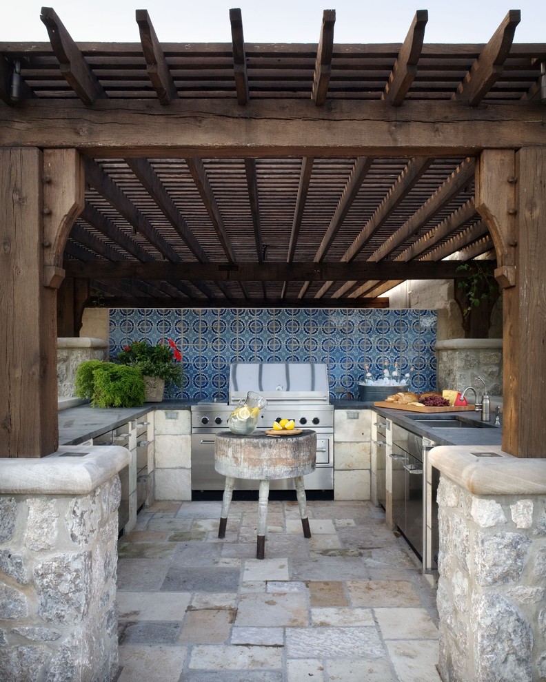 Outdoor kitchen with a roof and walls