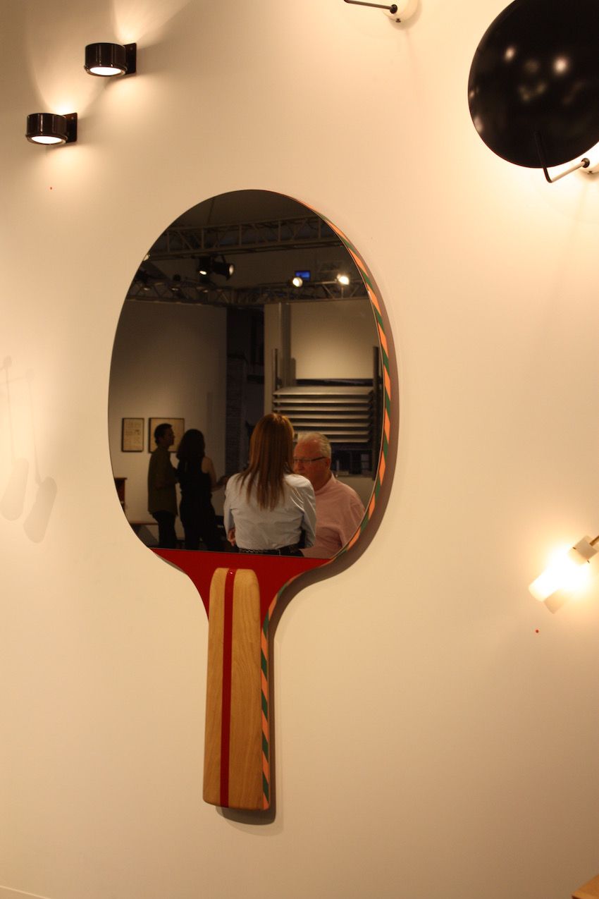 Ping pong anyone? We can;t think of a more perfect mirror for a fun family room area than this one from Gallery Kreo.