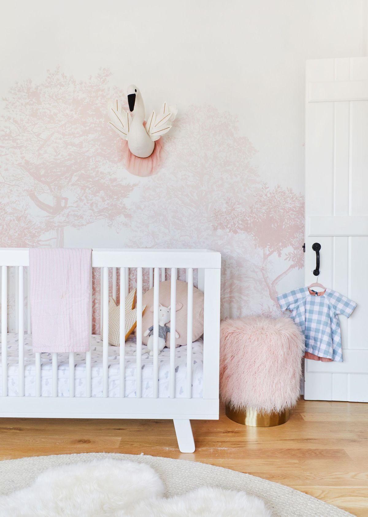 Pink girls nursery room wallpaper