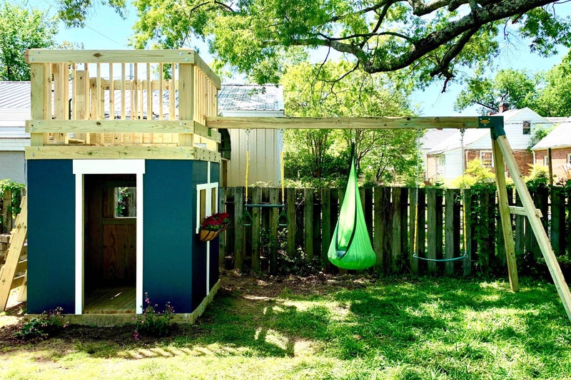 Playhouse with Balcony and Attached Swing Set
