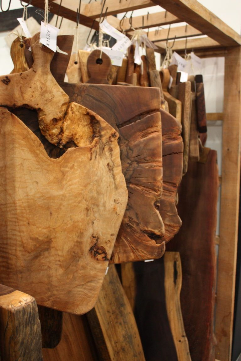 Live edge cutting and serving boards feature the beauty of natural flaws.