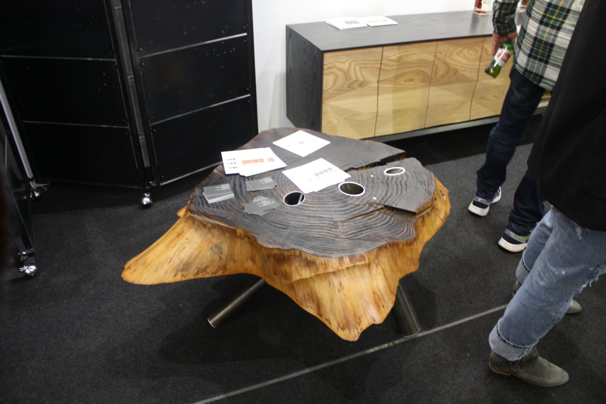 Polished wood tree base with legs coffee table