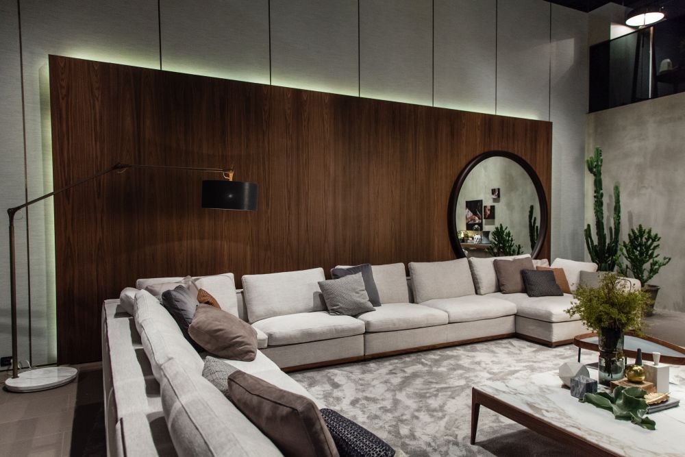 Porada living room layout with large wood paneled wall