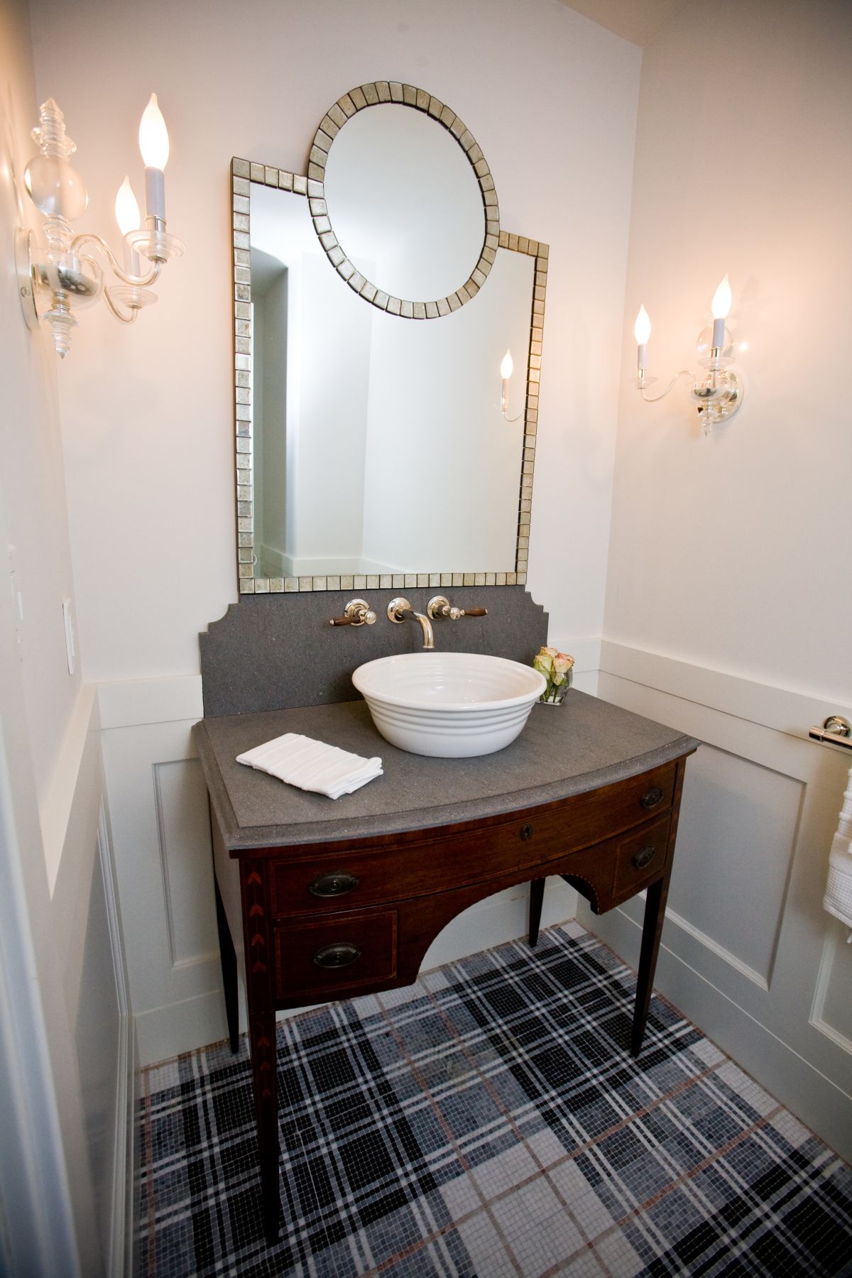 Powder room with mosaic floor tiles