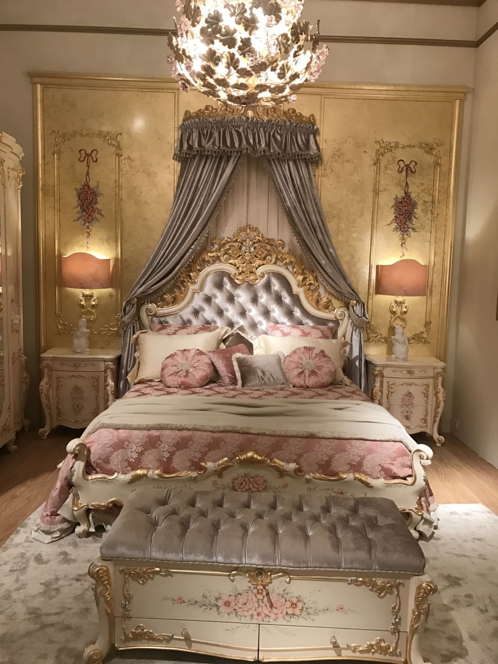 Princess bedroom with canopy and gray headboard tufted