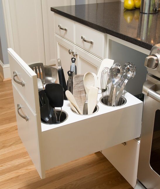Pull out drawer with kitchen spoons