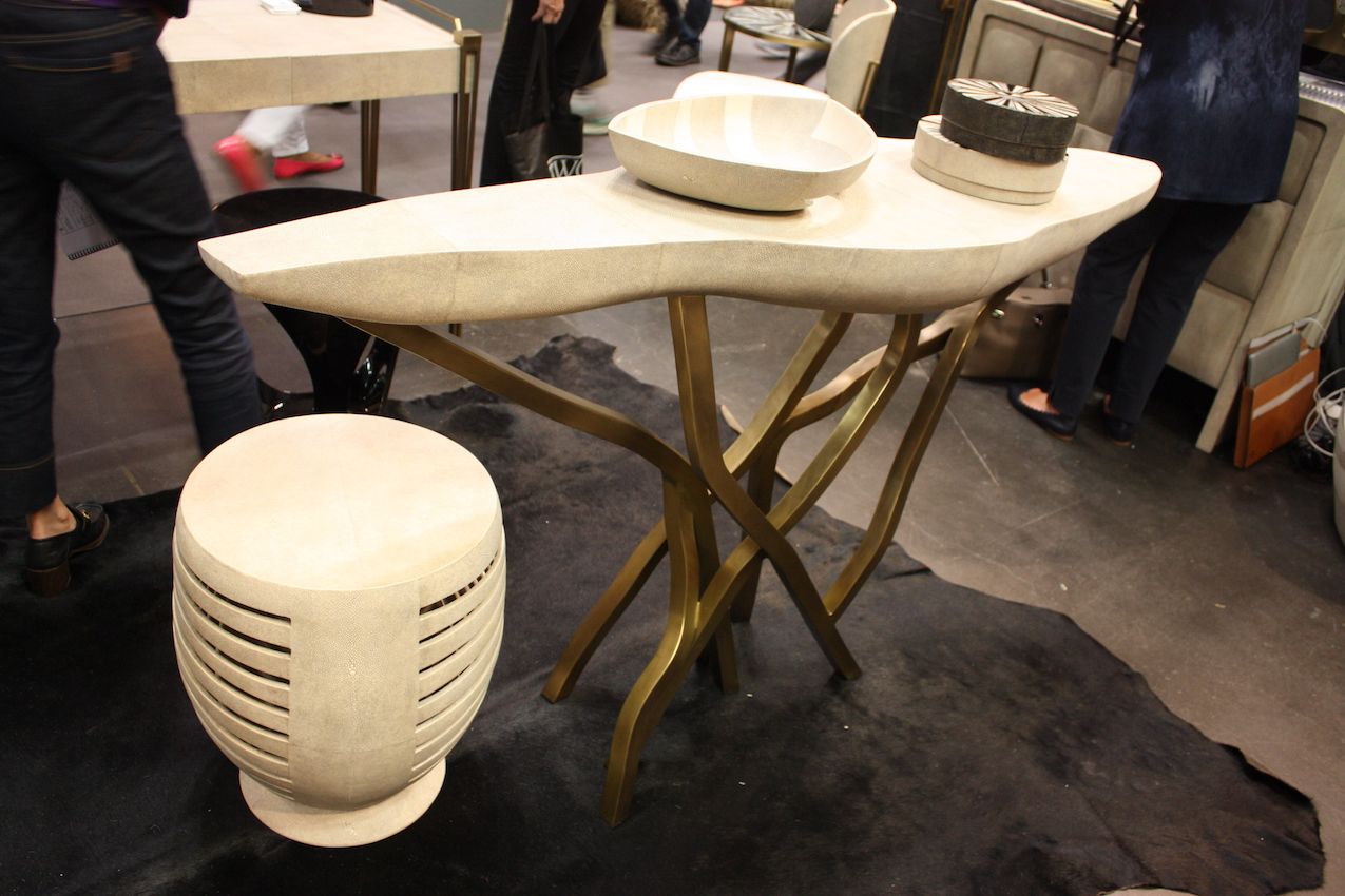 An organic shape and branching legs are appealing features of this console table.