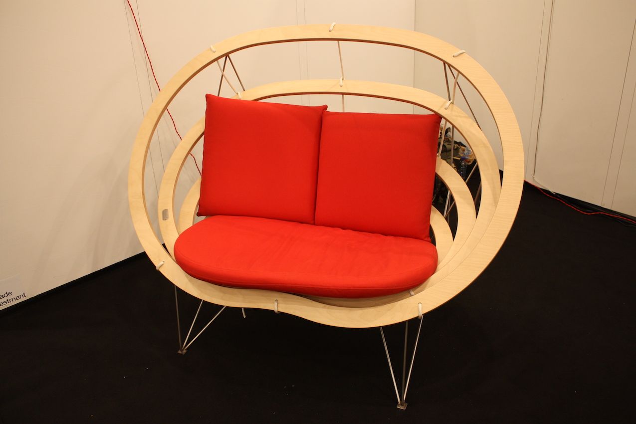 The Circa Chair holds its shape by gravity with ropes. Here it is suspended on a frame.