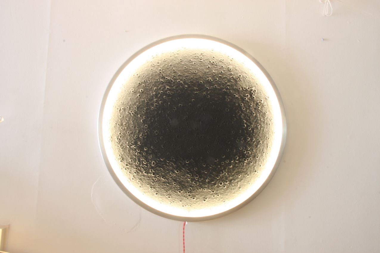 The Luna light is a perfect geometric circle.
