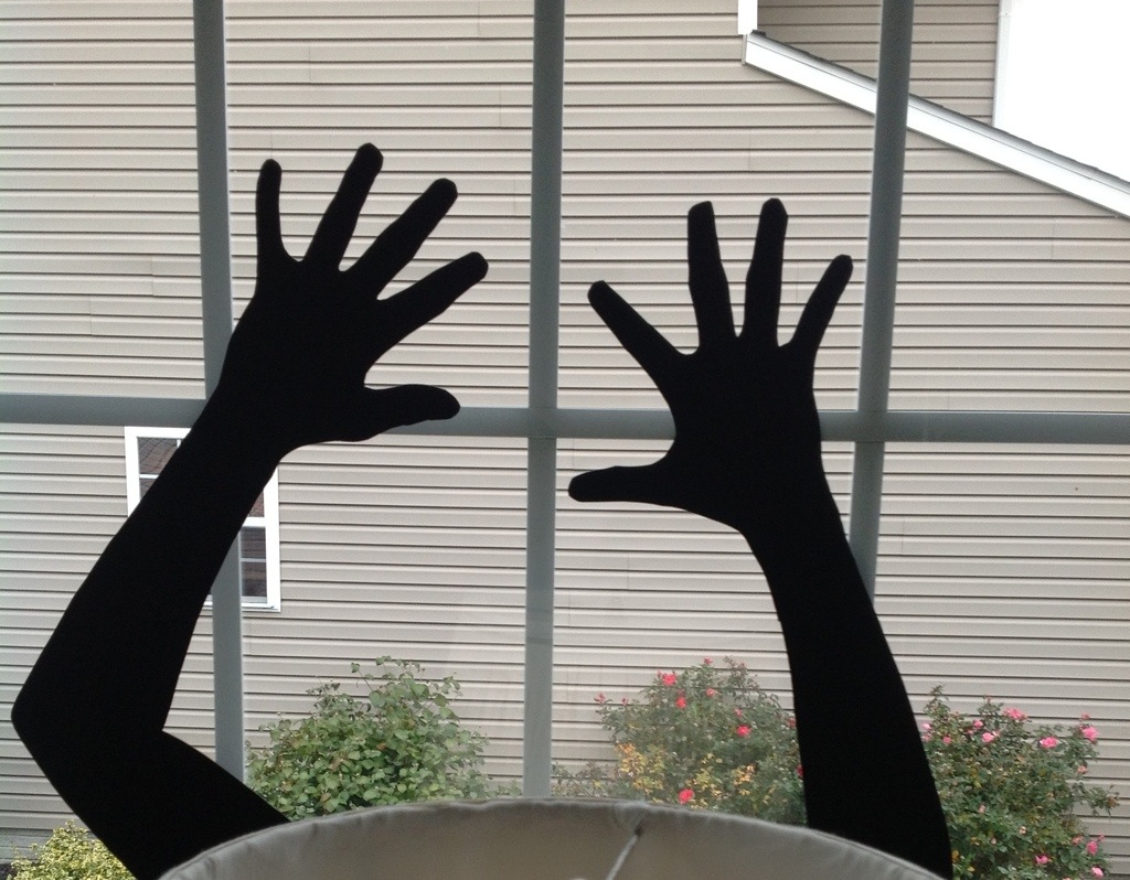 Reaching Hands Window Silhouette