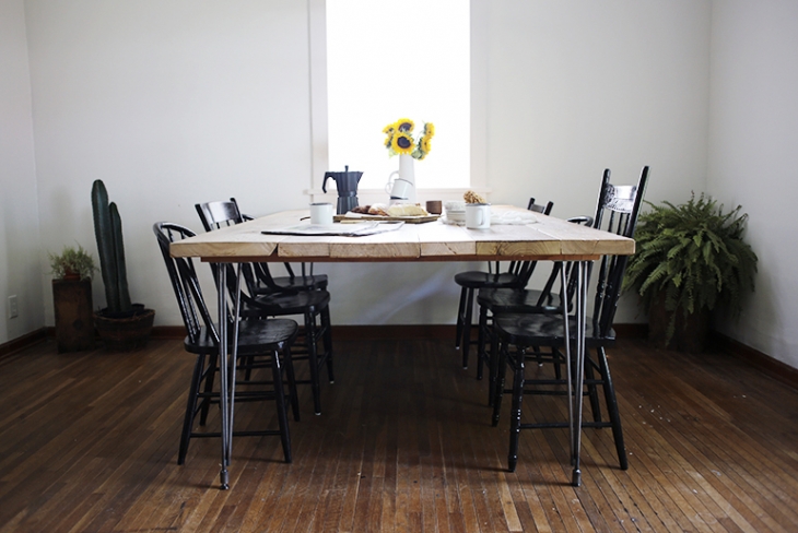 Reclaimed wood dining table with hairpin base