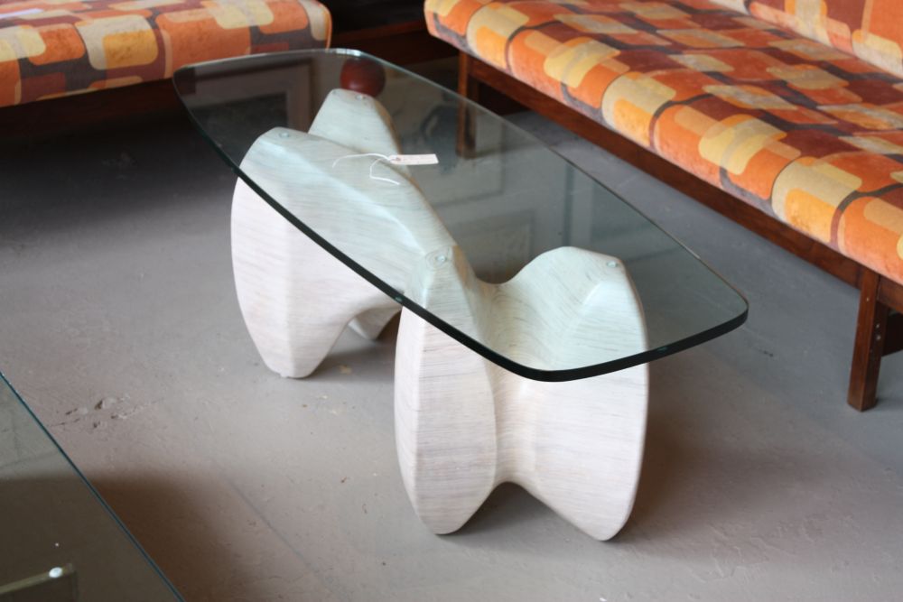 Although it doesn't have a round top, this table is a great central piece for modern living rooms