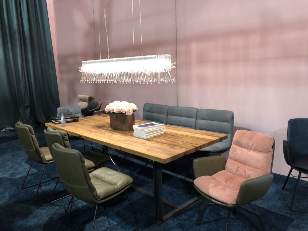 Turn a low-hanging chandelier or pendant lamp into a focal point for your dining room