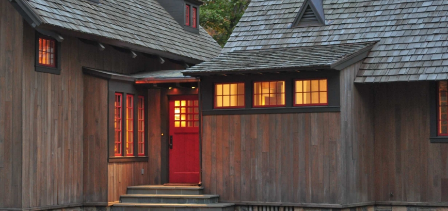 Red Front Door with Wood House