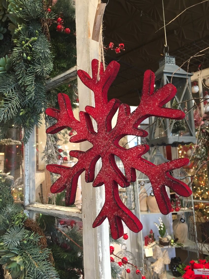 This giant snowflake is not only red, but also a bit rustic.