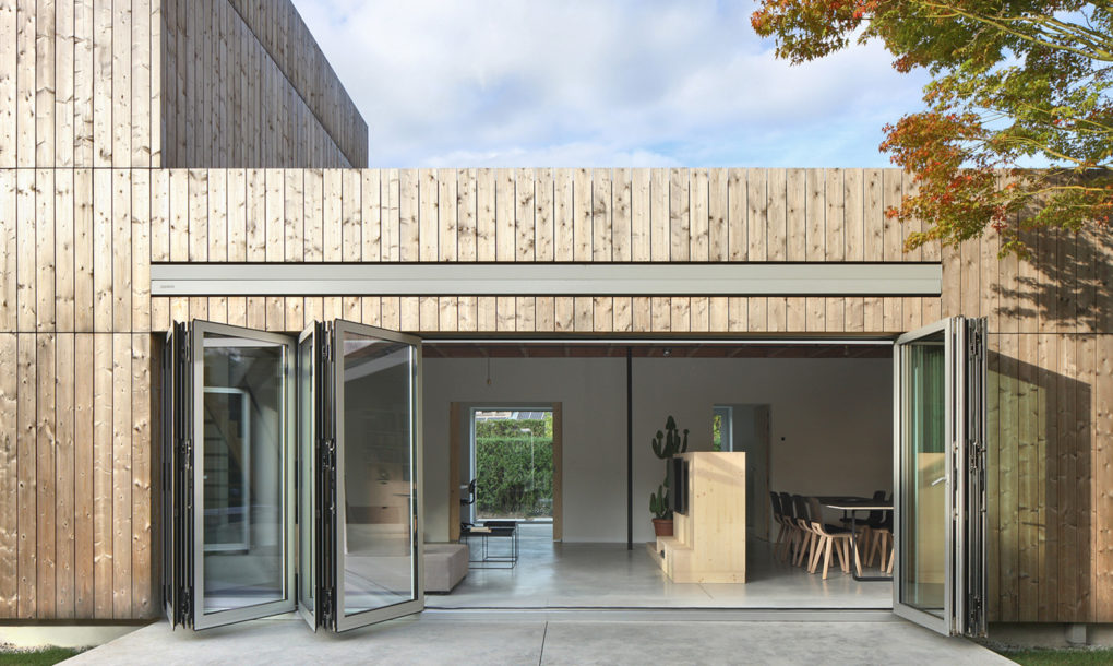 Renovated 1960s bungalow in Belgium folding windows