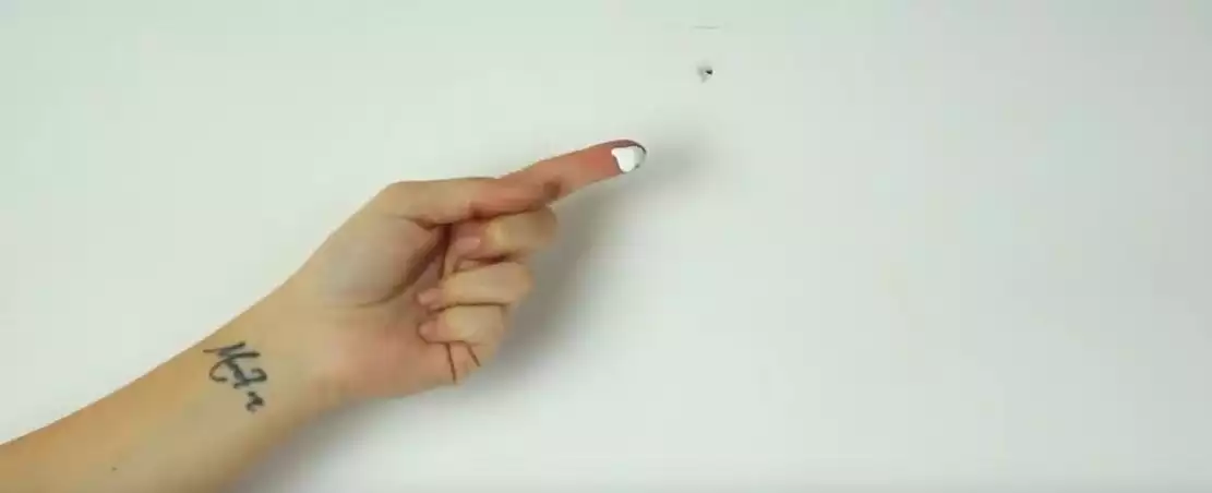 Repair wall holes with toothpaste