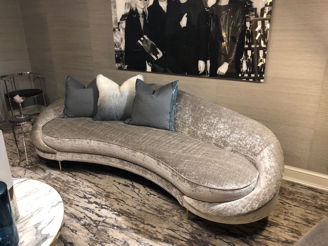 This silvery sofa is the stylish focal point of the lounge.