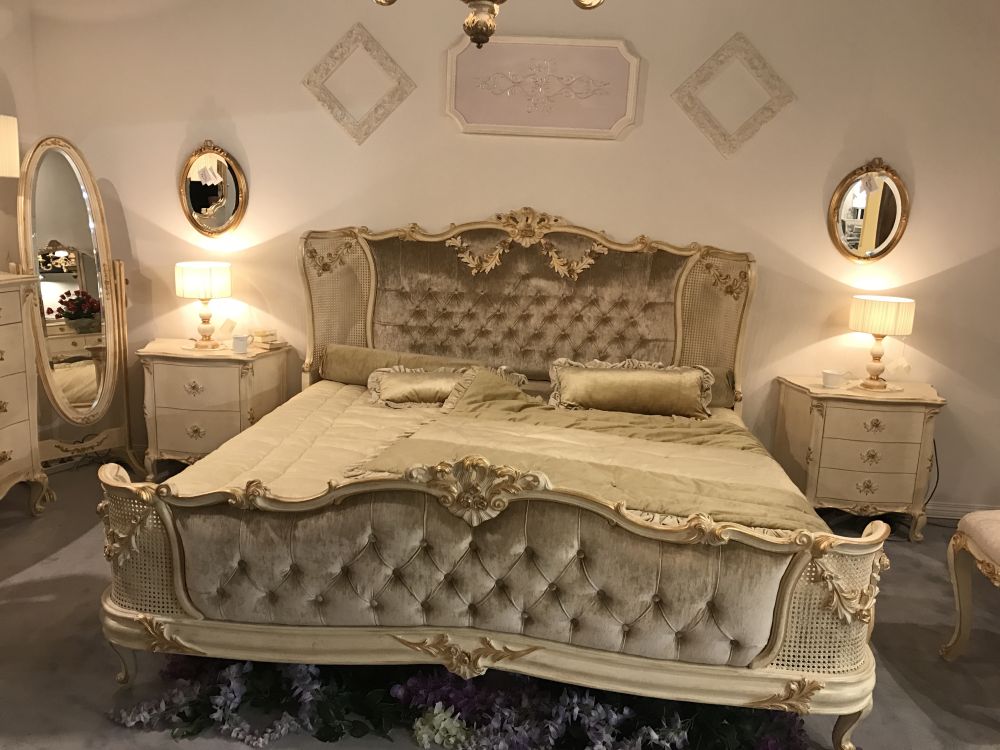 Rococo bedroom style with gray tufted headboard