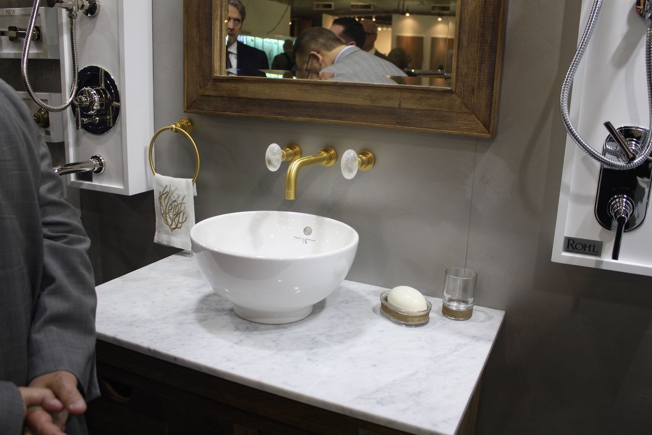 Rohl Washbasin with gold faucet