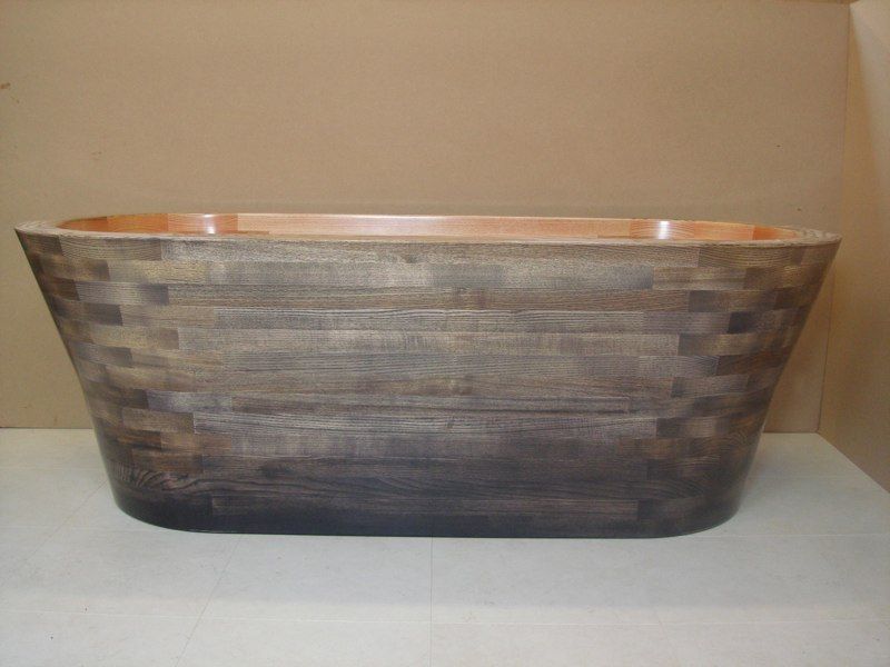 The Rosemarie wooden bathtub by Wooden Baths Ltd in Scotland is coated with a High Clarity glass reinforced epoxy resin. This coating is incredibly hard wearing. The glass fabric reinforcing makes the bath extremely resistant to changes in humidity, temperature and high UV levels.