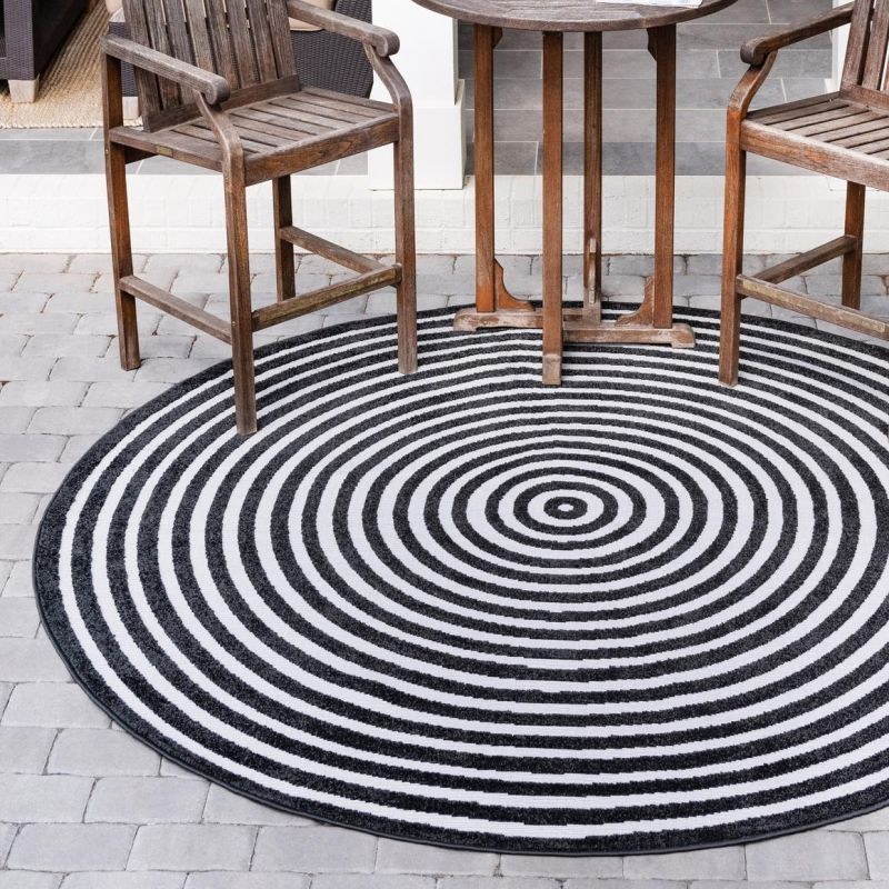 Round black and white carpet design