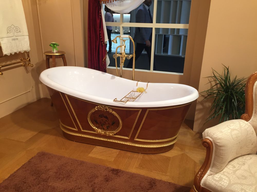 Royal bathroom freestanding tub with gold accents